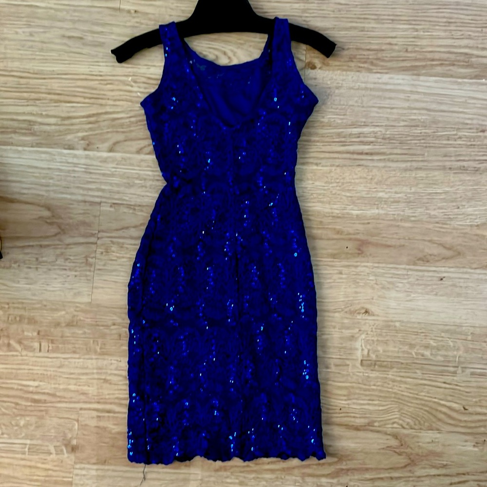 “Jump Apparel” blue sequin. Perfect for the holidays or a graduation!!